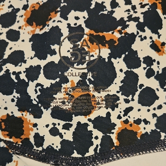 SAGE Collective Black and Orange Patterned Leggings - Picture 2 of 6